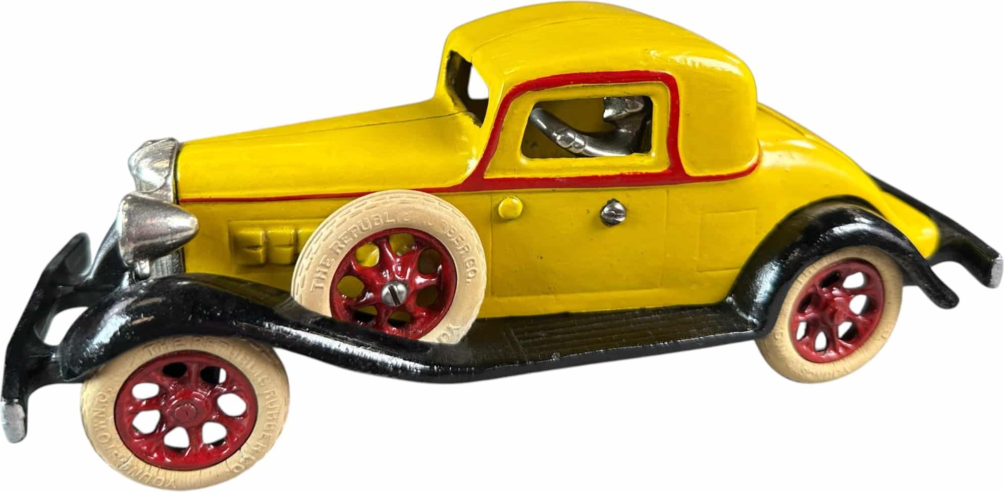 Arcade REO Royale coupe cast-iron toy car, 9 inches long